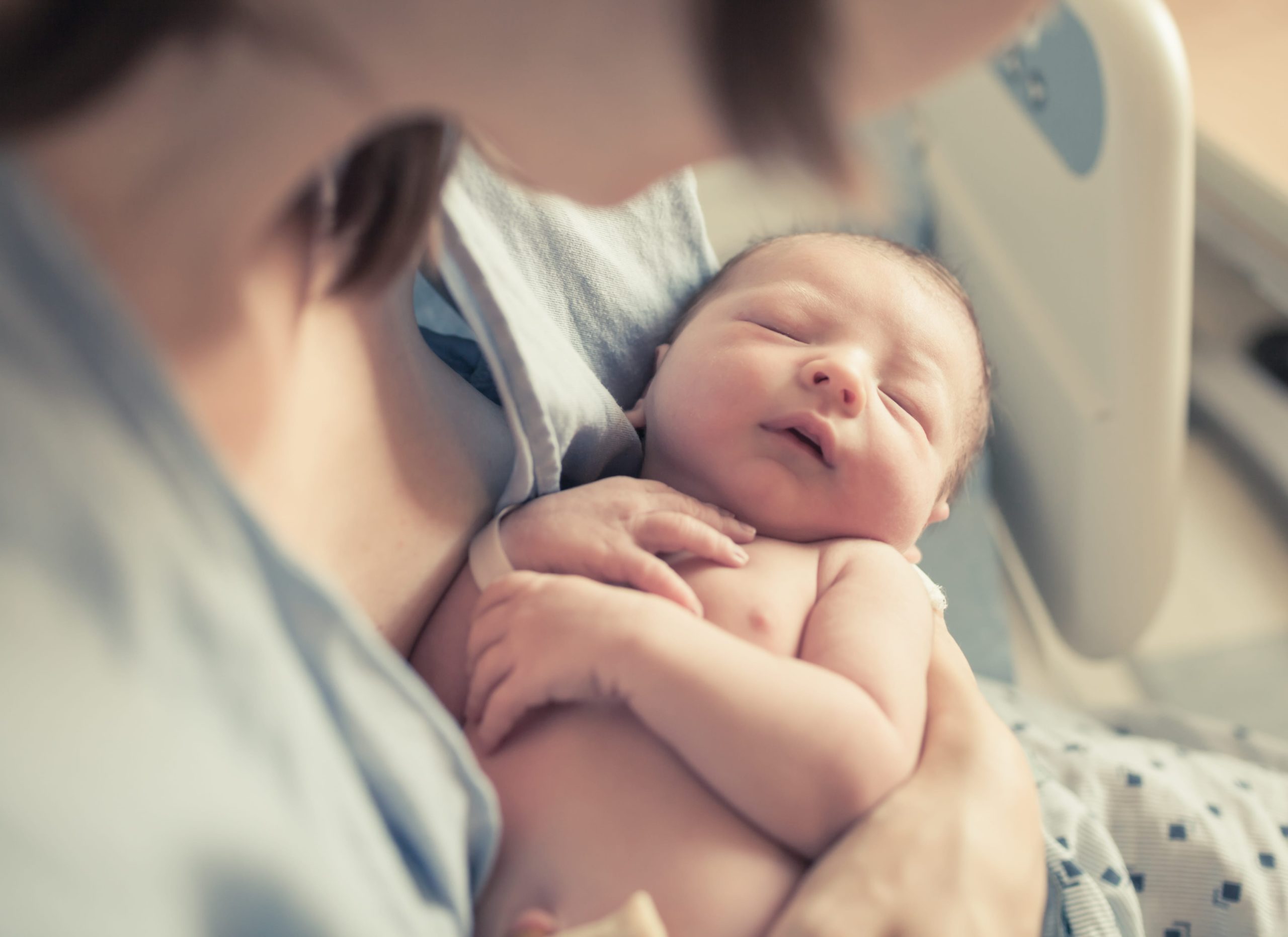 Mom holding her newborn baby