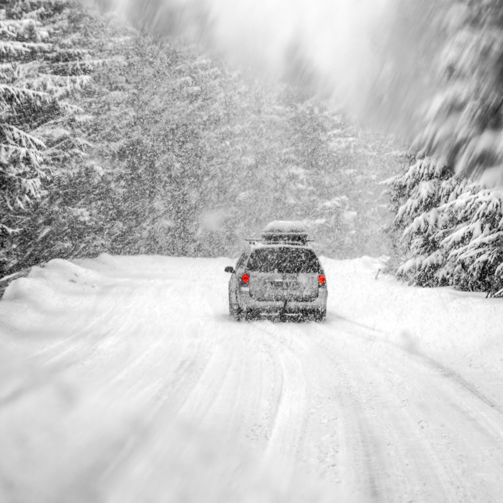 a car in the snow storm