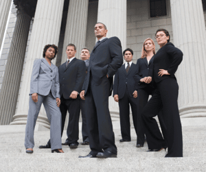 a group of attorneys standing on stairs