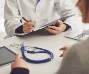 a patient talking to a doctor